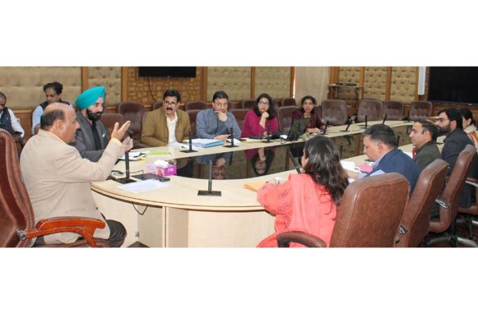 DyCM Surinder Kumar Choudhary addressing officers during meeting at Jammu.