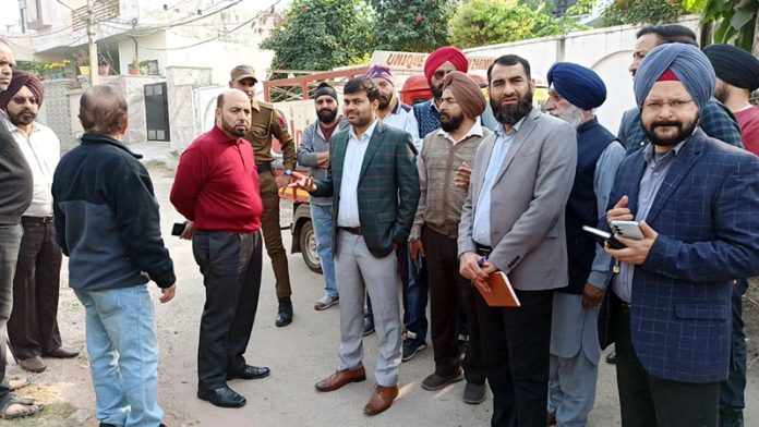 Commissioner JMC conducting tour of Trikuta Nagar area on Saturday.