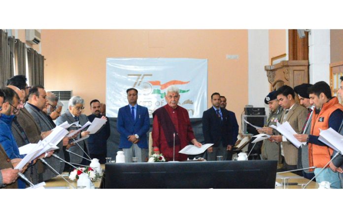 LG Manoj Sinha leading the senior officers to read Preamble to the Constitution of India.