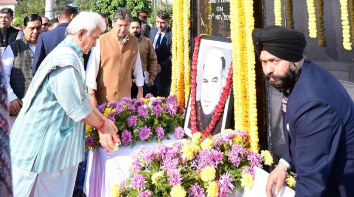 LG Manoj Sinha paying tribute to former Finance Minister Girdhari Lal Dogra at Dogra Chowk, Jammu.