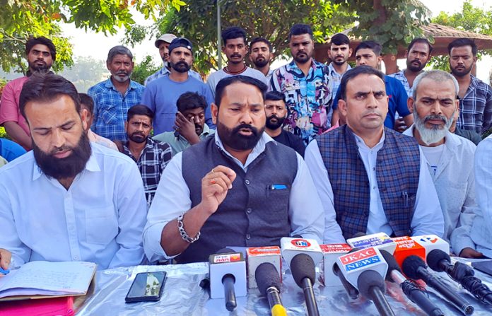 Akhil Bhartiya Safai Mazdoor Sangh leaders addressing press conference at Jammu on Monday.