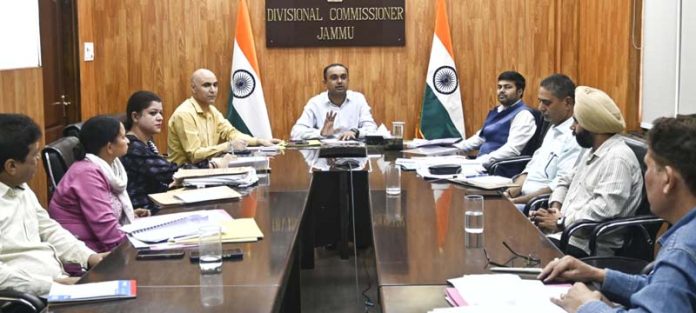 Div Com chairing a meeting at Jammu on Thursday.