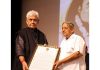 Lt Governor Manoj Sinha presents Pandit Haridutt Sharma Award to Dr. H R Nagendra.