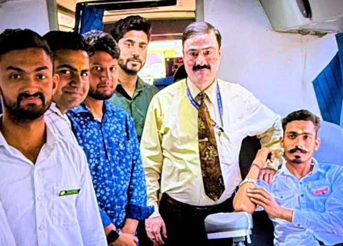 A student donating blood at GDC Marh. A student donating blood at GDC Marh.