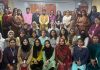 Guests and participants posing together during a function organized to commemorate birth anniversary of Ahilya Bai Holkar.