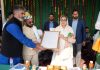 Chairperson J&K Waqf Board, Dr Darakhshan Andrabi distributing awards during a function in Kishtwar.