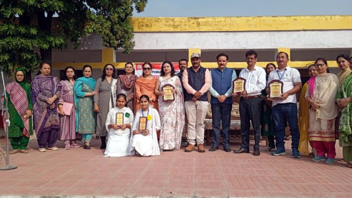 CBC officials posing with winners of drawing competition and seminar at GHSS Ghou Manhasa, Jammu.