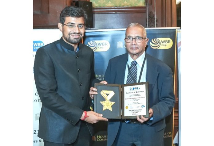 Kunal Saini, SIPS Trustee receiving Breaking Barriers for Girls' Education award on behalf of the School at a function in London. Kunal Saini, SIPS Trustee receiving Breaking Barriers for Girls' Education award on behalf of the School at a function in London.