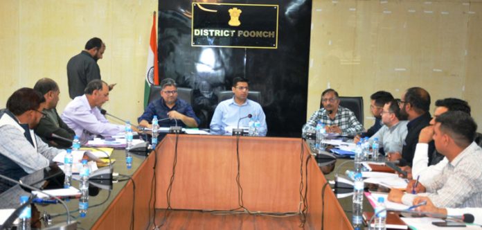 DC Poonch chairing a meeting.