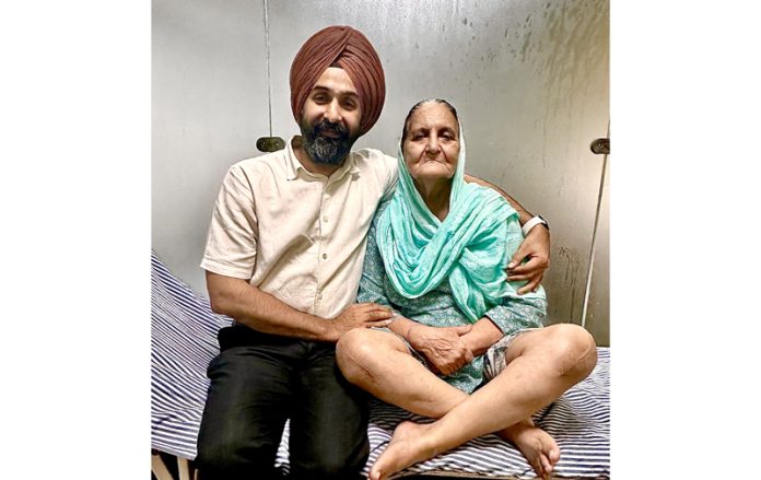Dr Ranjit Singh posing along with Lazya Kour after operating her on Saturday.