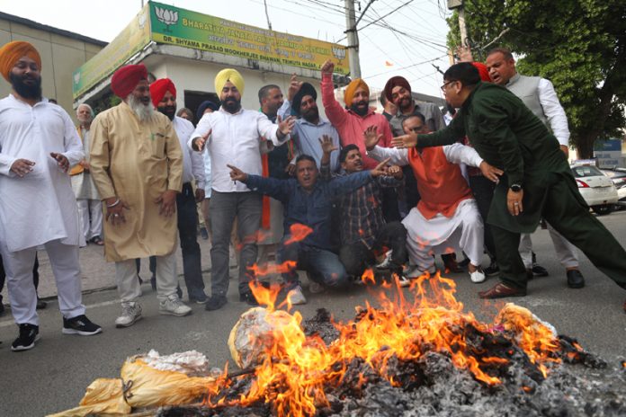 BJP Minority Morcha leaders and activists protesting at Jammu. BJP Minority Morcha leaders and activists protesting at Jammu.