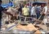 Municipal Council team during anti-encroachment drive in Rajouri town on Monday. -Excelsior/Imran