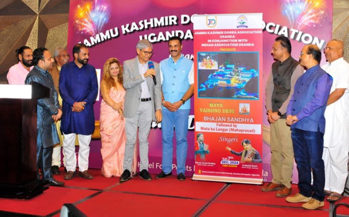 Indian High Commissioner in Uganda announcing launch of Mata Ka Jagran during Diwali Milan by J&K Dogra Association in Uganda.
