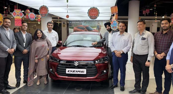 Rachna Arora, National Head of Axis Bank, launching new Dzire at Jammu Motors on Wednesday. Rachna Arora, National Head of Axis Bank, launching new Dzire at Jammu Motors on Wednesday.