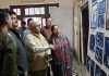 Principal Secretary Culture, Suresh Kumar Gupta along with organizers during an exhibition of artworks in Jammu.