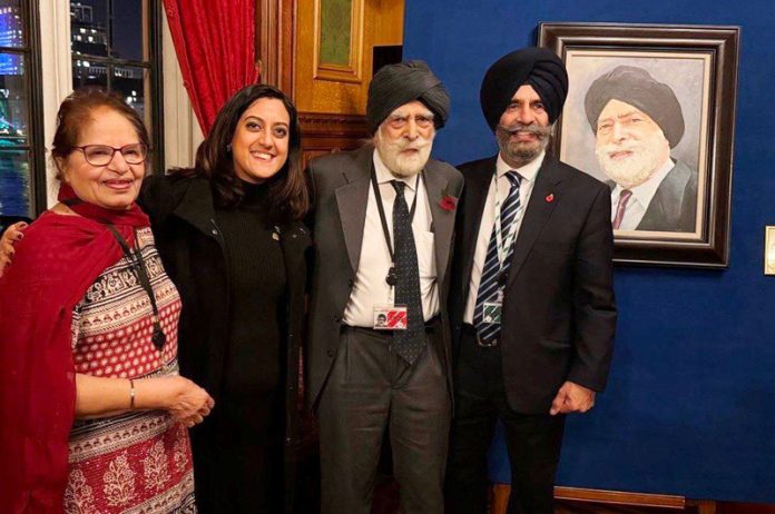 Lord Dr Indarjit Singh with his family members. Lord Dr Indarjit Singh with his family members.