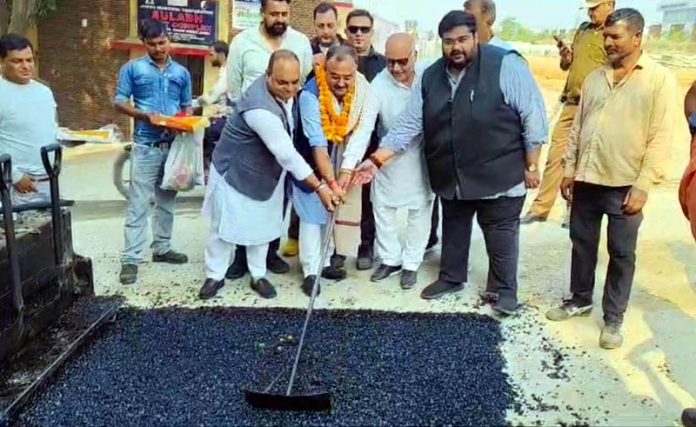 MLA Bahu, Vikram Randhawa kick-starting patch work of roads in Ward 50 and 51 of his constituency on Saturday.