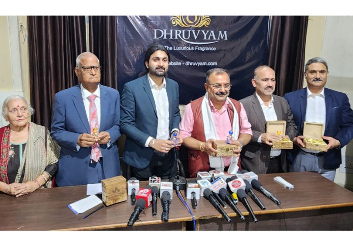 Entrepreneur Dhruv Chopra launches his exclusive Attar brand 'Dhruvyam' at Jammu on Tuesday.