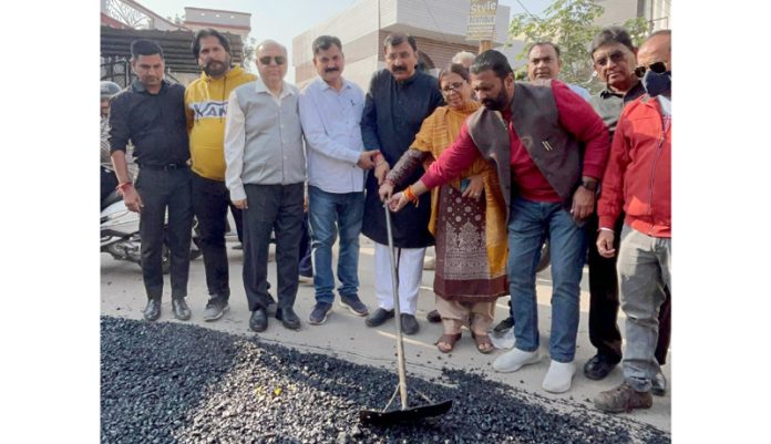 MLA Arvind Gupta kick-starting blacktopping work of road in Kabir Colony on Thursday. MLA Arvind Gupta kick-starting blacktopping work of road in Kabir Colony on Thursday.
