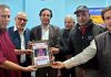 Dignitaries presenting Laleshwari Samman to Ramesh Marhatta at Jammu.