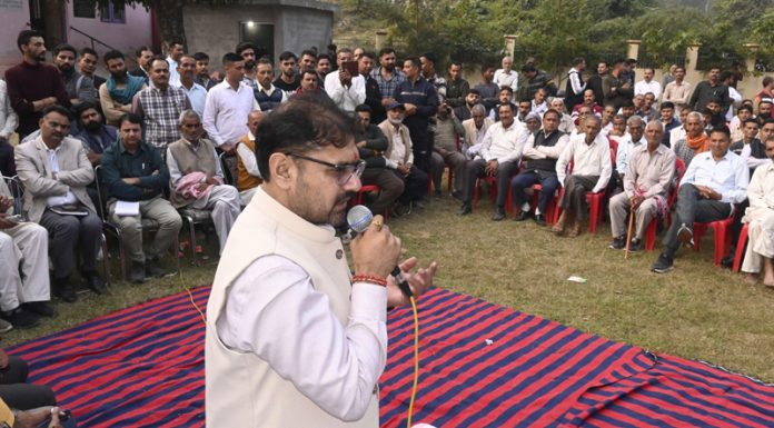 Minister Satish Sharma addressing public during tour to Chhamb constituency.