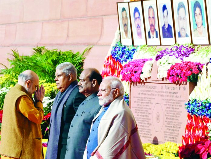 Prime Minister Narendra Modi, Vice President Jagdeep Dhankhar, Lok Sabha Speaker Om Birla and Union Home Minister Amit Shah during a ceremony to pay homage to martyrs who lost their lives in the 2001 Parliament attack at Parliament House in New Delhi on Friday. (UNI)