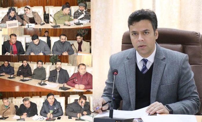 DC Srinagar chairing a meeting on Tuesday.