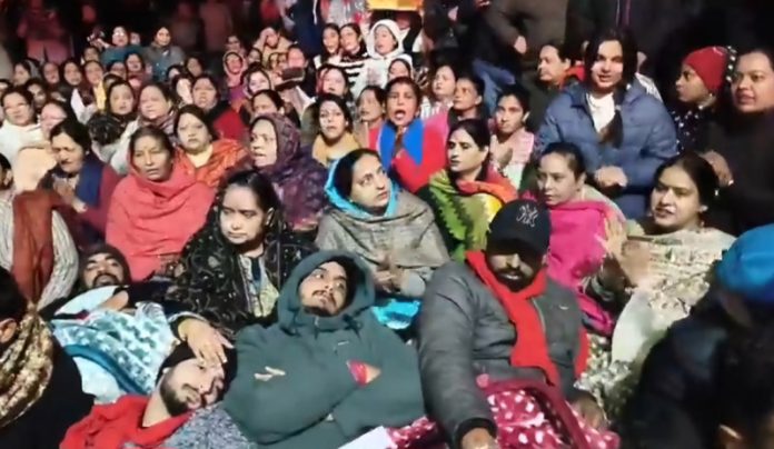 Protestors, including women at Phawara Chowk, Katra. Another pic on page 4.