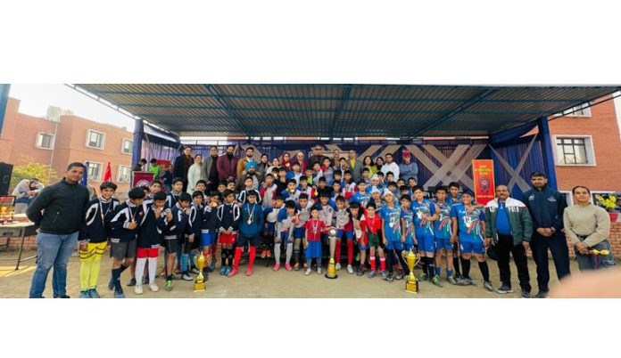 Players posing along with trophies during prize distribution ceremony of Doon International School. Players posing along with trophies during prize distribution ceremony of Doon International School.