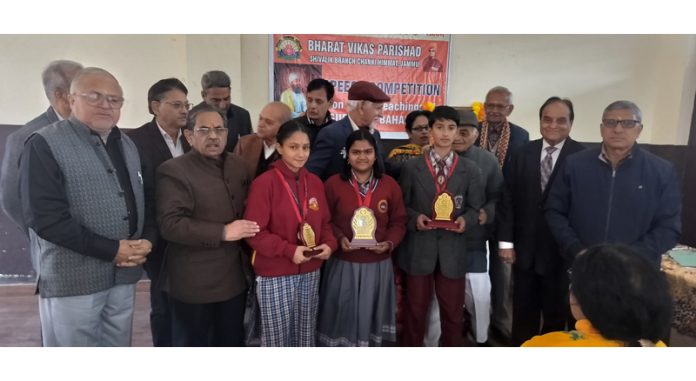 Students posing along with trophies during a speech competition at Jammu. Students posing along with trophies during a speech competition at Jammu.
