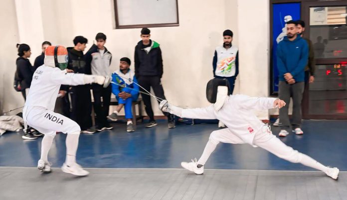 Fencers in action during selection trials at MA Stadium Jammu.