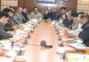 DyCM Surinder Kumar Choudhary chairing a meeting.