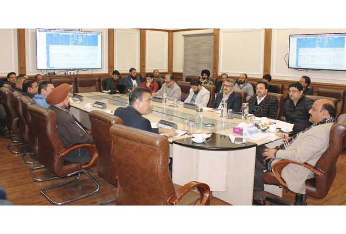 DyCM Surinder Choudhary chairing a meeting on Monday. DyCM Surinder Choudhary chairing a meeting on Monday.