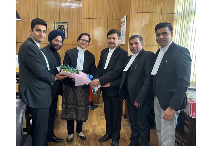 Newly elected team of Bar Association Jammu meeting with Justice Sindhu Sharma.