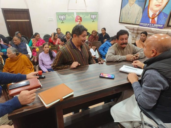 BJP MLA Jammu East, Yudhvir Sethi listening public grievances at Jammu on Thursday.