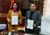 Director JKEDI and Principal, Govt Degree College for Women, Kathua displaying copies of MoU signed by them.