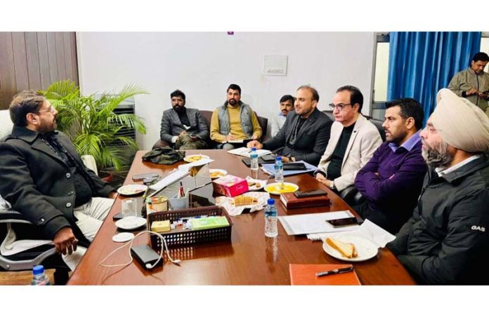 Minister Satish Sharma chairing a meeting on Wednesday.