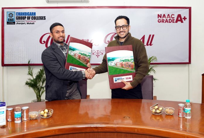 Arsh Dhaliwal, MD of CGC Mohali posing along with Waqar Khan on Wednesday.