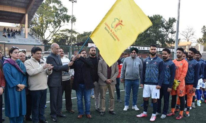 Sports Minister Satish Sharma flagging off J&K Football team for Santosh Trophy on Wednesday.