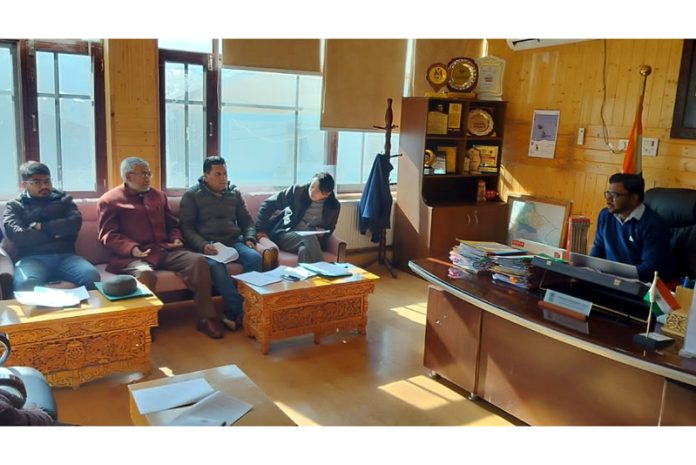 DC Kargil chairing a meeting on Friday.