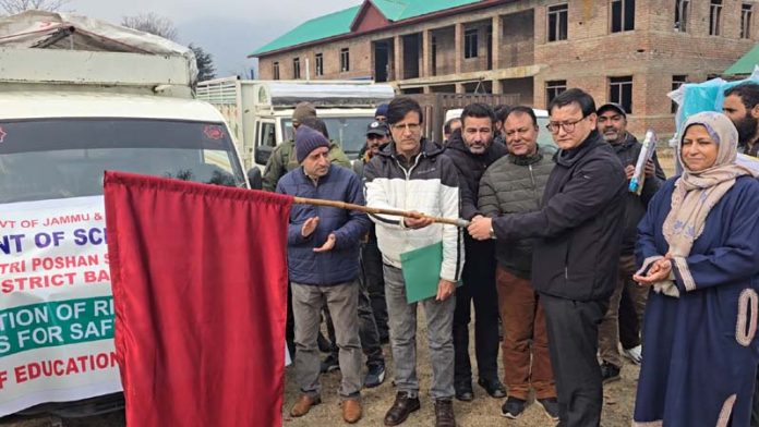 DC Baramulla flagging of vehicles carrying rice bin for distribution to schools on Thursday.