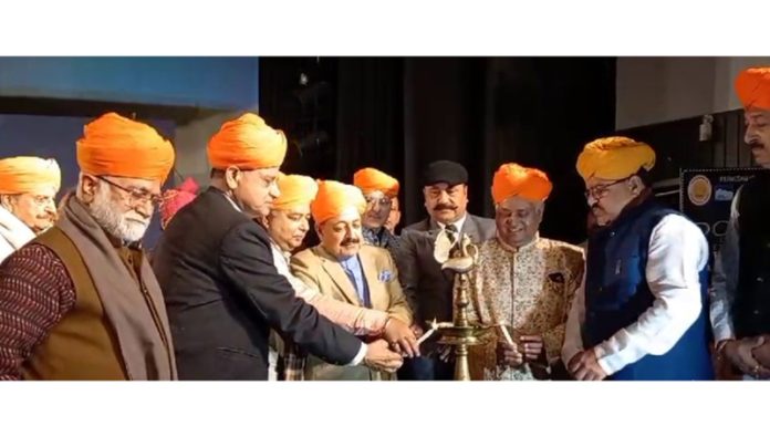 Union Minister Dr Jitendra Singh and other dignitaries lighting the lamp at a function in Jammu on Sunday.