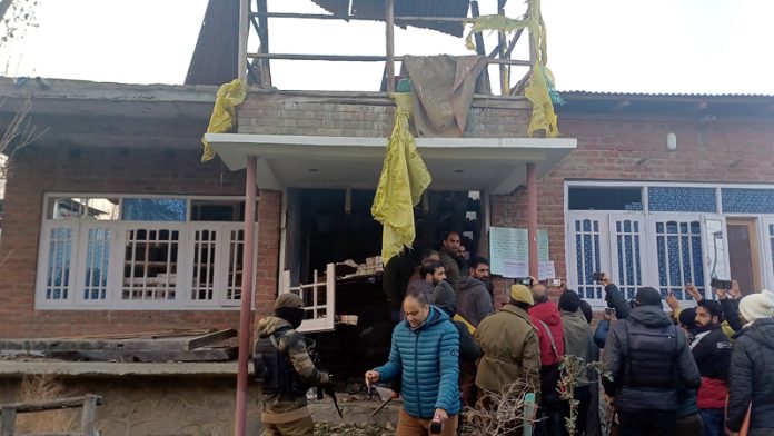 A property being attached in Kulgam.