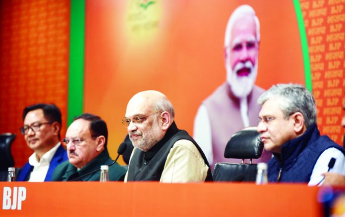 Union Home Minister Amit Shah addressing a press conference at BJP headquarters in New Delhi on Wednesday. (UNI )