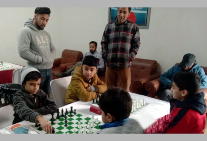 Chess players displaying keen interest during a game at Srinagar. Chess players displaying keen interest during a game at Srinagar.