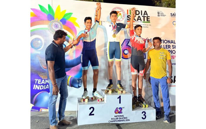 Puneesh Puri poses on podium alongside fellow medallists during the 62nd National Roller Skating Championship in Mysore, Bangalore.