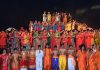 Students of KC Public School posing for a group photograph in traditional dresses during the school's 26th Annual Function.