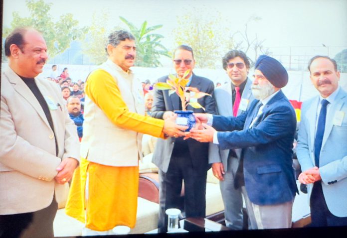 MP Jugal Kishore Sharma receiving plant during annual day event of IDPS Akhnoor. MP Jugal Kishore Sharma receiving plant during annual day event of IDPS Akhnoor.