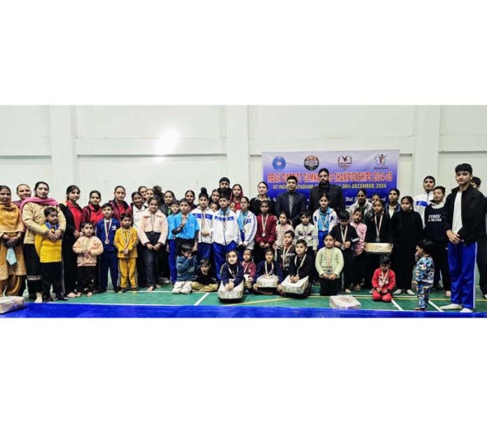 Gymnasts posing along with dignitaries during a championship at Reasi. Gymnasts posing along with dignitaries during a championship at Reasi.
