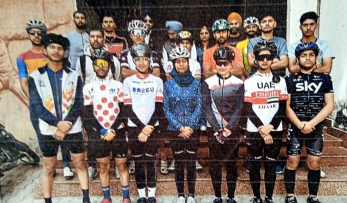 Selected cyclists posing for group photograph. Selected cyclists posing for group photograph.